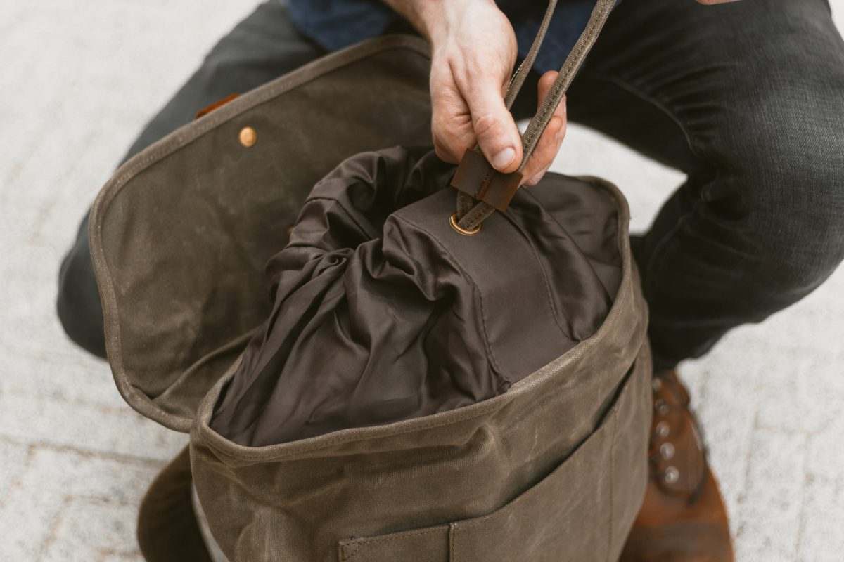 Waxed Canvas Backpack & Leather Rucksack - Weatherproof Commuter Laptop Backpack - Menswear Denim Rugged Style Flatlay - The Kingston in Moss by Oldfield