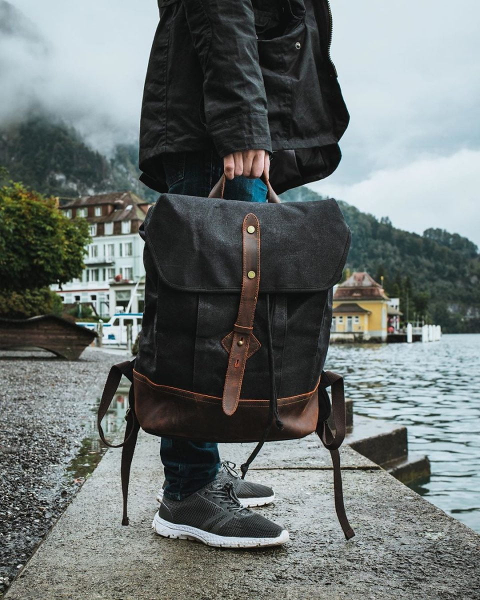 Waxed Cotton Canvas and Leather Backpack Rucksack - Menswear Denim Rugged Style Outfit Switzerland Rhône Glacier - The Kingston in Graphite by Oldfield - Photo by Brad Newman