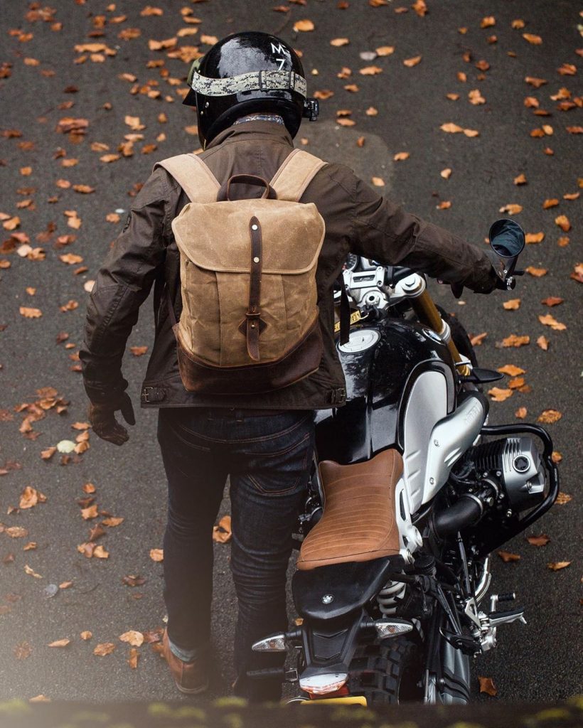 Waxed Cotton Canvas and Leather Backpack Rucksack - Menswear Denim Rugged Style Outfit Cafe Racer Explore Expedition Motorbike Tour - The Kingston in Sandstone by Oldfield - Photo by Ricky Phoolka