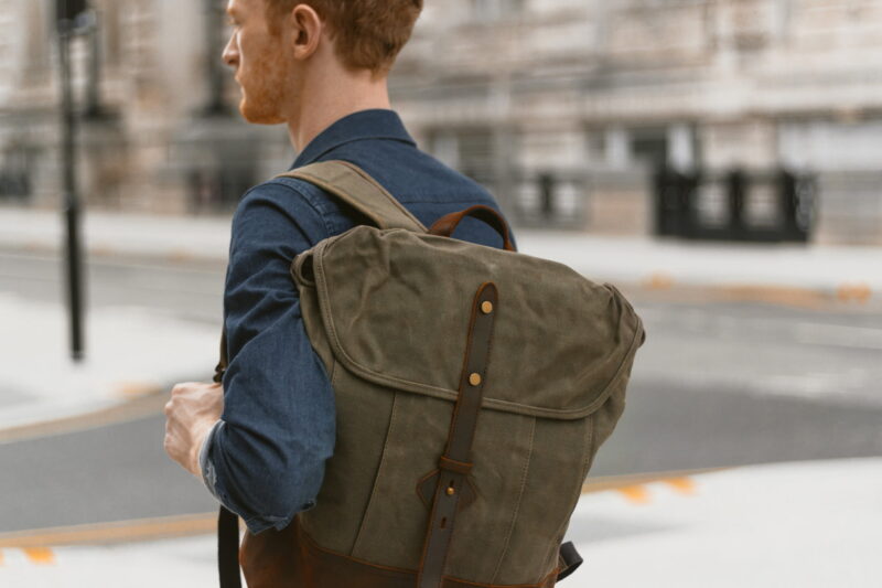 Waxed Canvas Backpack & Leather Rucksack - Weatherproof Commuter Laptop Backpack - Menswear Denim Rugged Style Flatlay - The Kingston in Moss by Oldfield